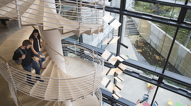 students on spiral staircase