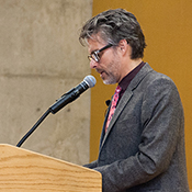 Chabon reads to audience at the podium