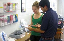 Students look through wellness pamphlets.