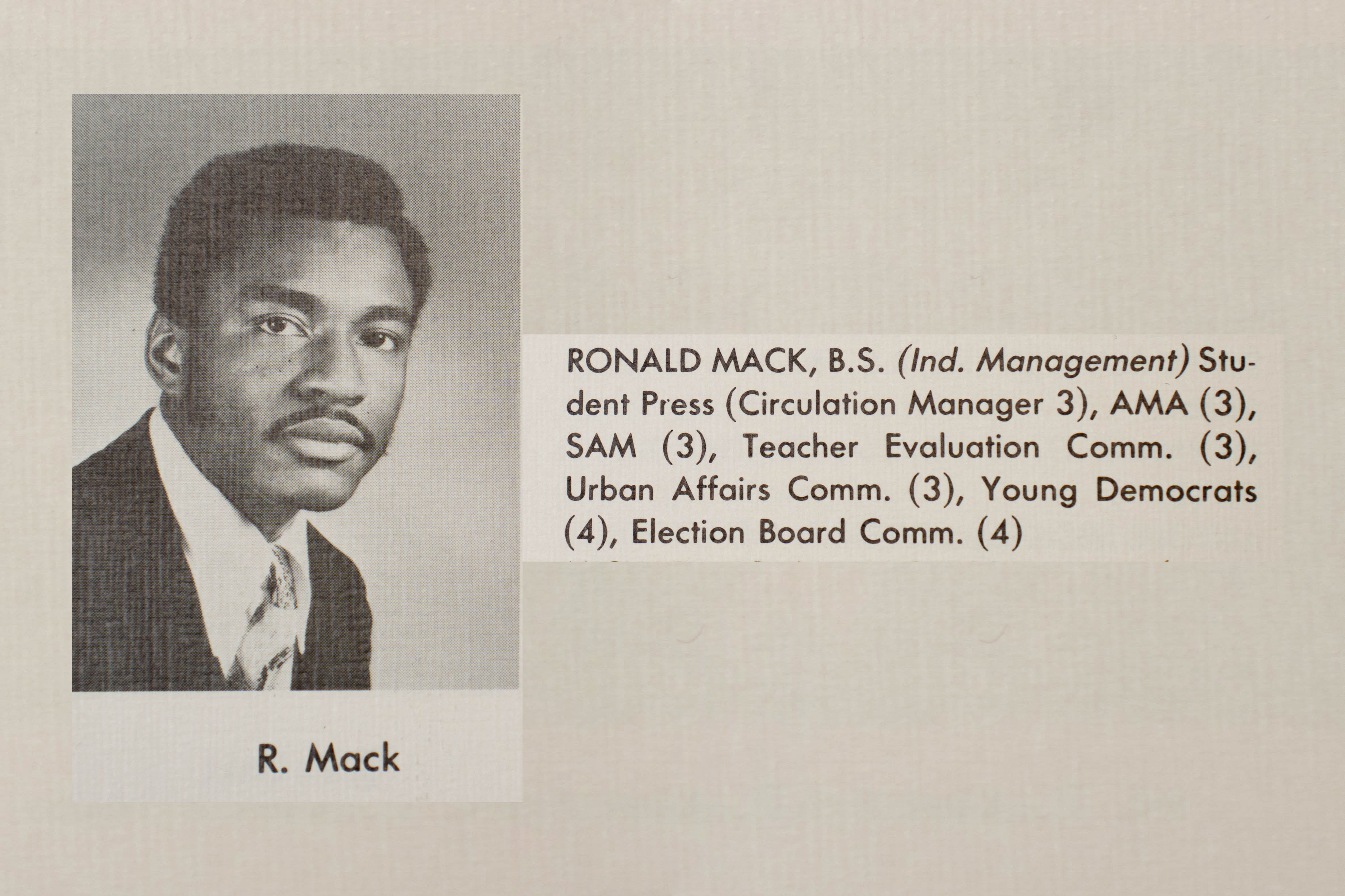 The 1971 yearbook entry for a student named Ronald Mack, B.S. in Industry Management graduate. The entry includes information about his involvement, including: Student Press (Circulation Manager 3), AMA (3), SAM (3), Teacher Evaluation Committee (3), Urban Affairs Committee (3), Young Democrats (4), Election Board Committee (4)