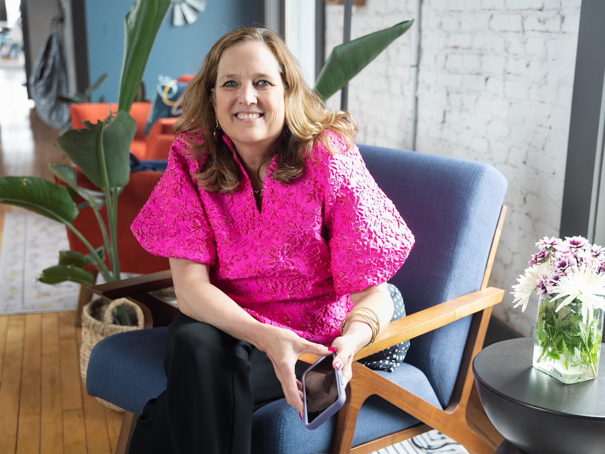 Tracy Imm sitting in a chair