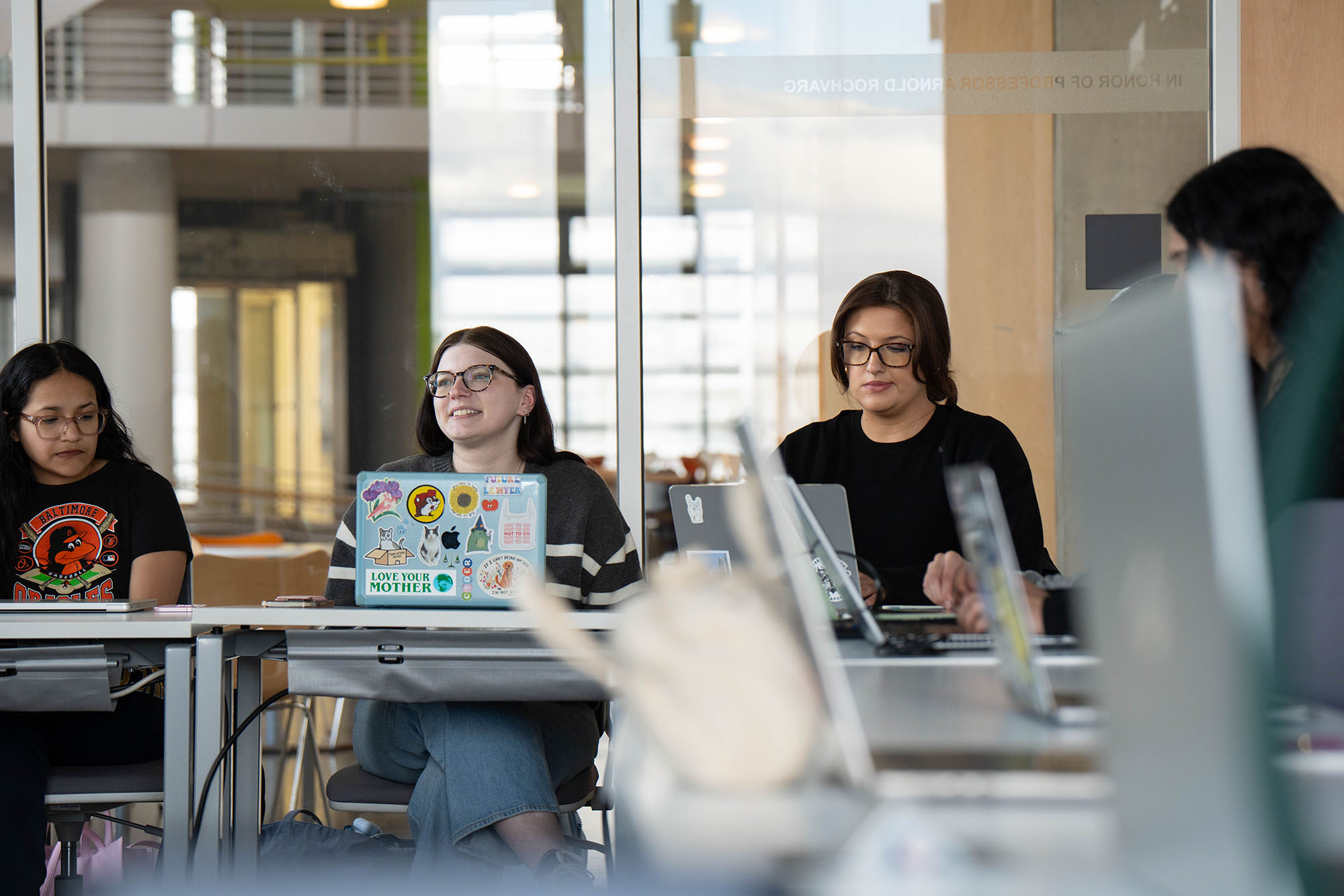 Students show various reactions during a class.