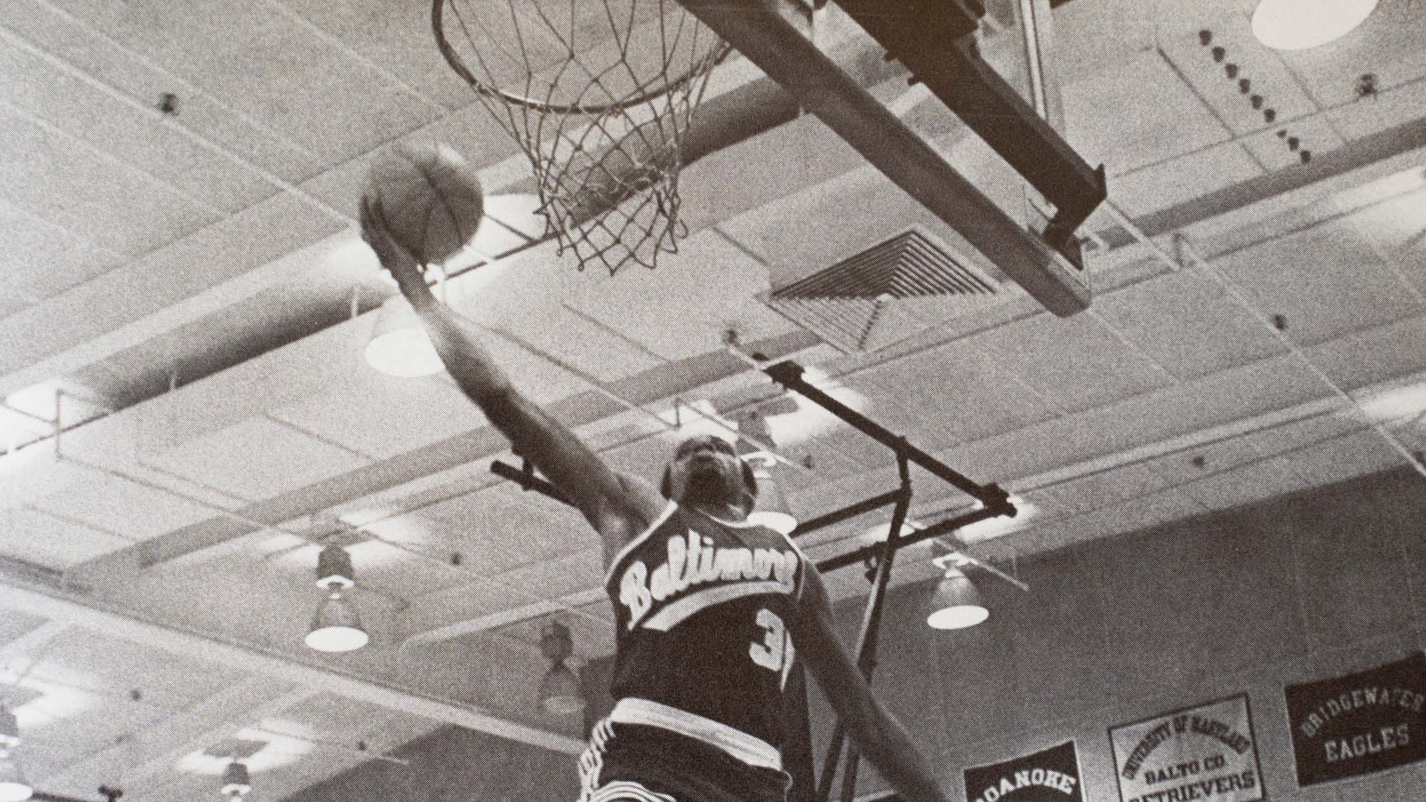 basketball player rising to the basket
