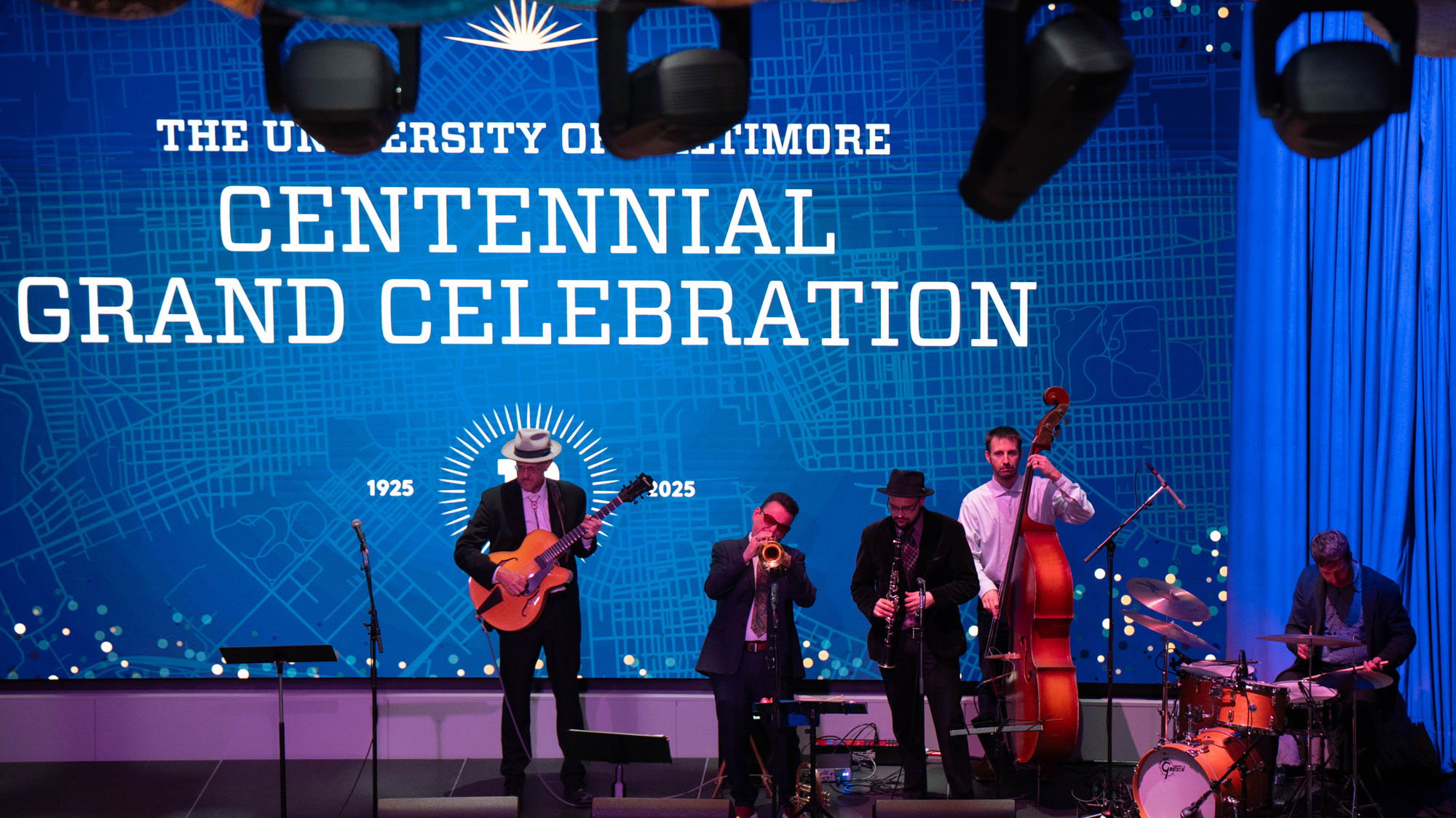 The band plays on the front stage during the Grand Celebration in November 2025. 