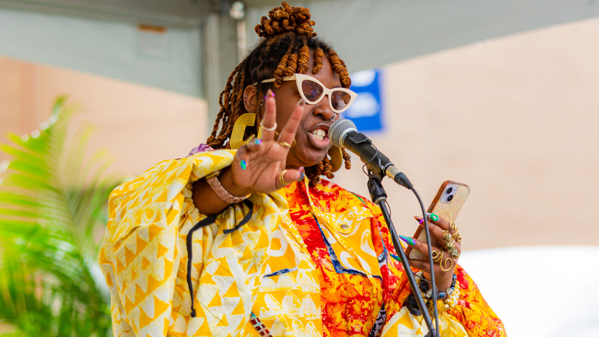 Maryland poet laureate Lady Brion, MFA '18, performs at the Centennial Rock the Block in April. 