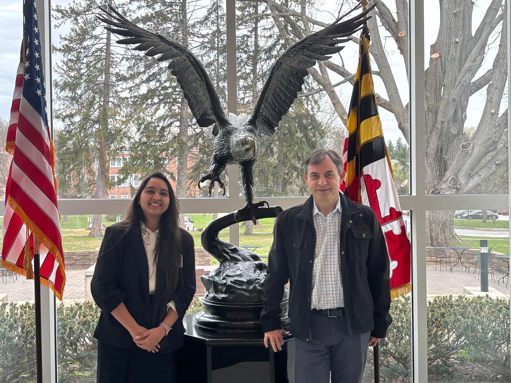 Harshitha poses with her professor and mentor, Ioan Marginean, of The University of Baltimore