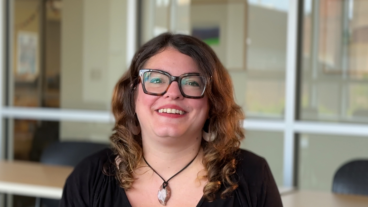 Kara Kaufmann laughs during an interview.
