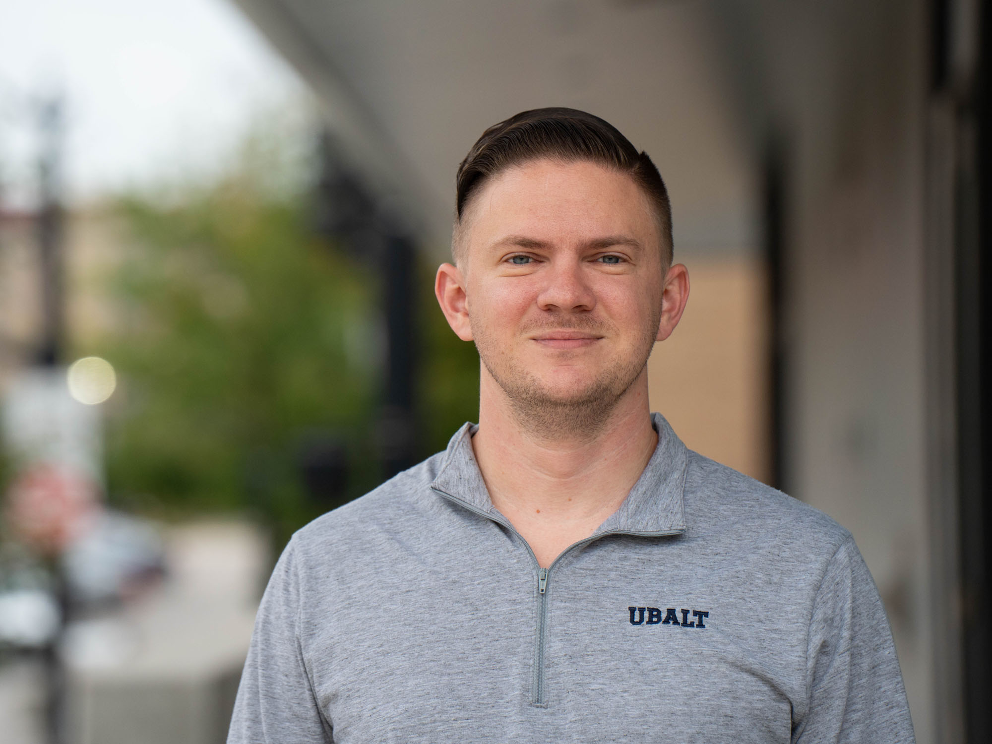Michael Claxton poses for a photo on campus.