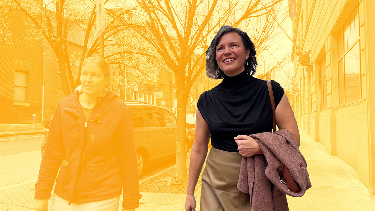Shelly Clay-Robison walks toward the camera in a colorized graphic made to make her standout.