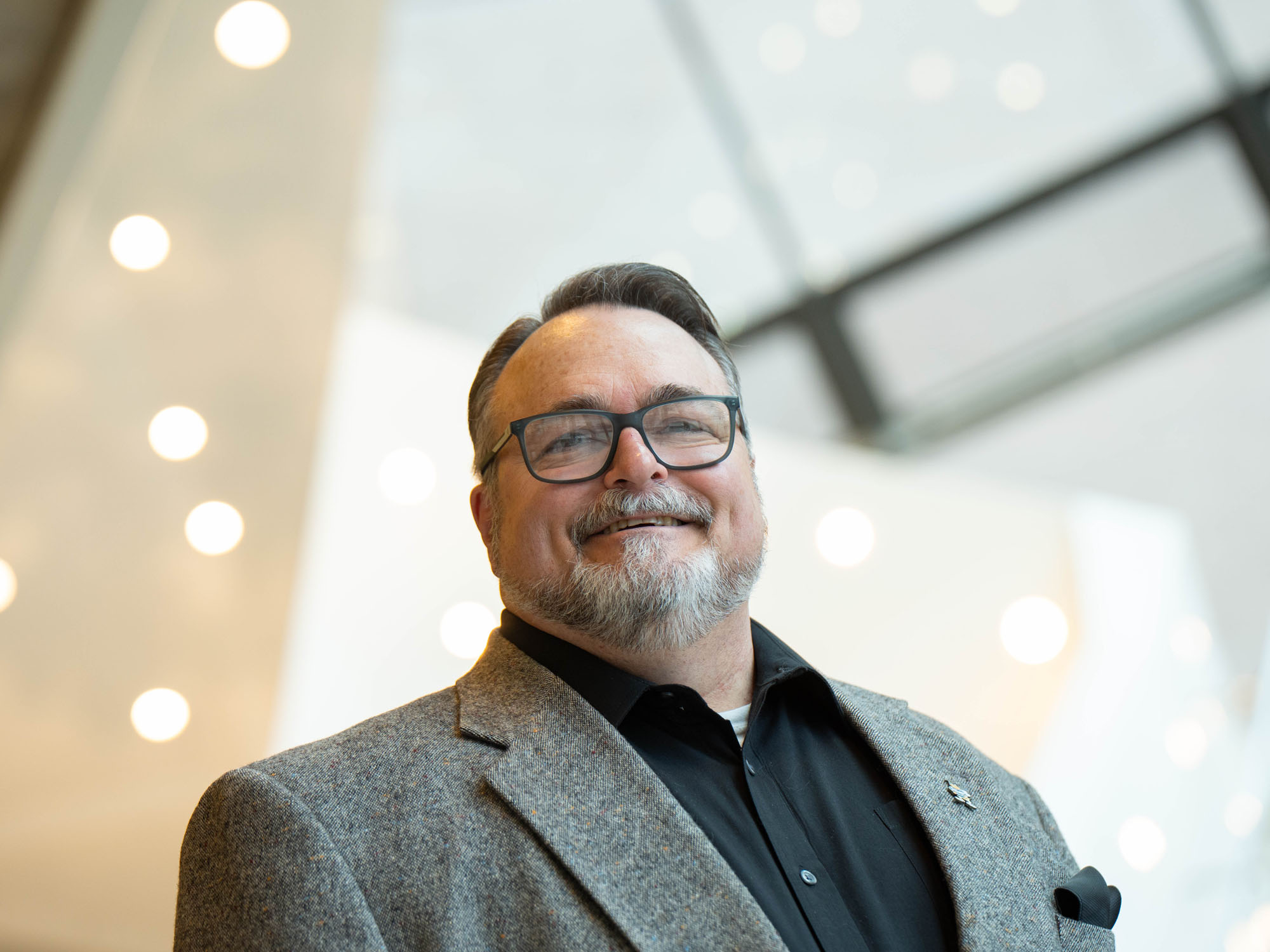 Troy Pritt poses in the library