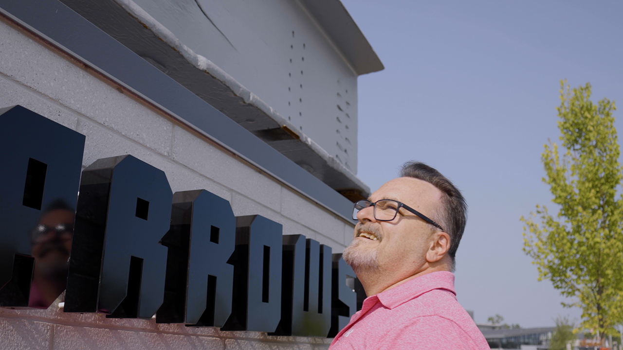 Troy Pritt looks at a Sparrows Point steel sign.