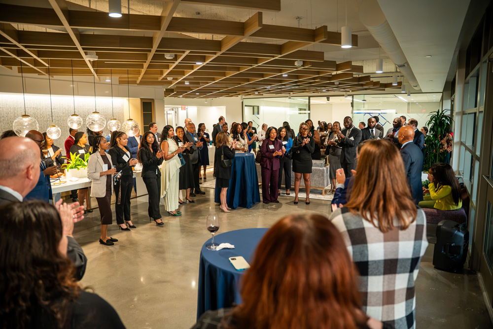 Attendees applaud during the Fannie Angelos Program celebration at an off-campus venue.