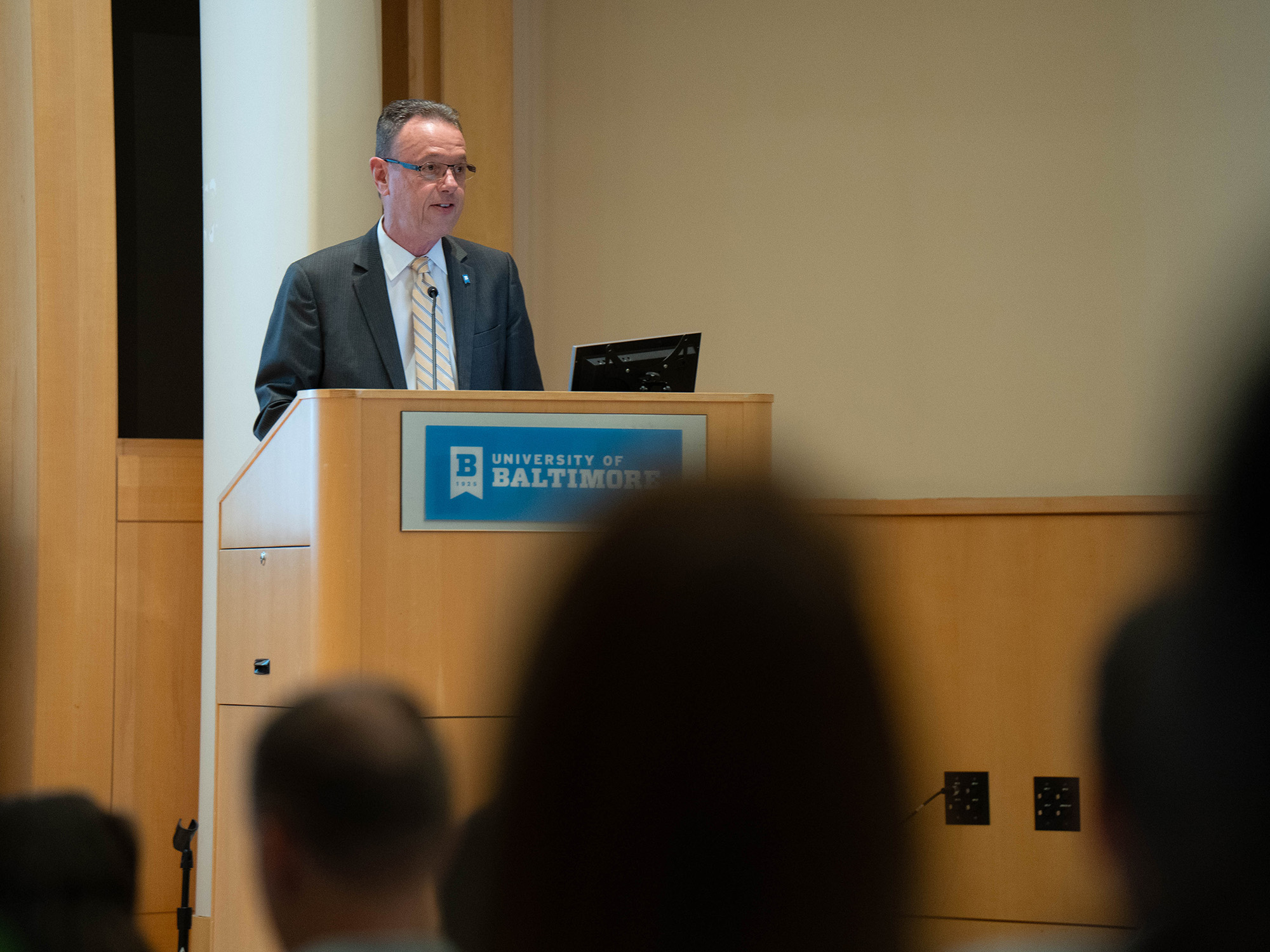 Photo of Provost Ralph Mueller at the podium