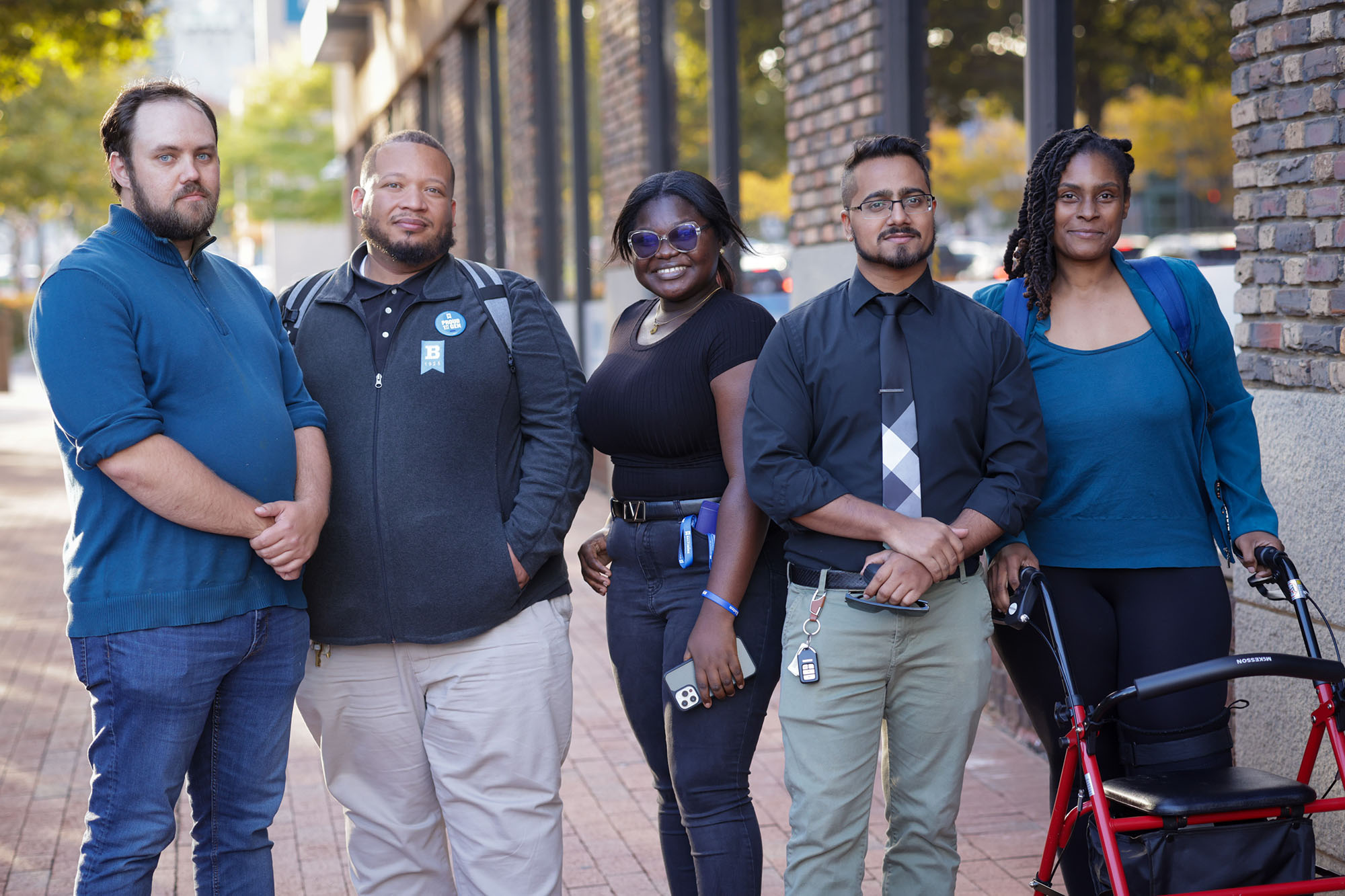 Group of students standing in front of the Academic Center