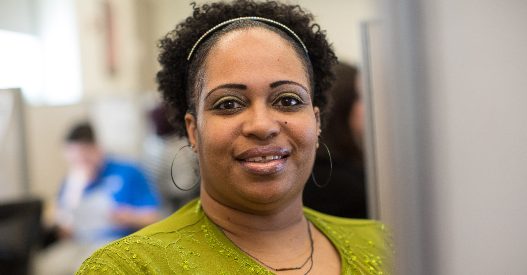 female student wearing a green shirt