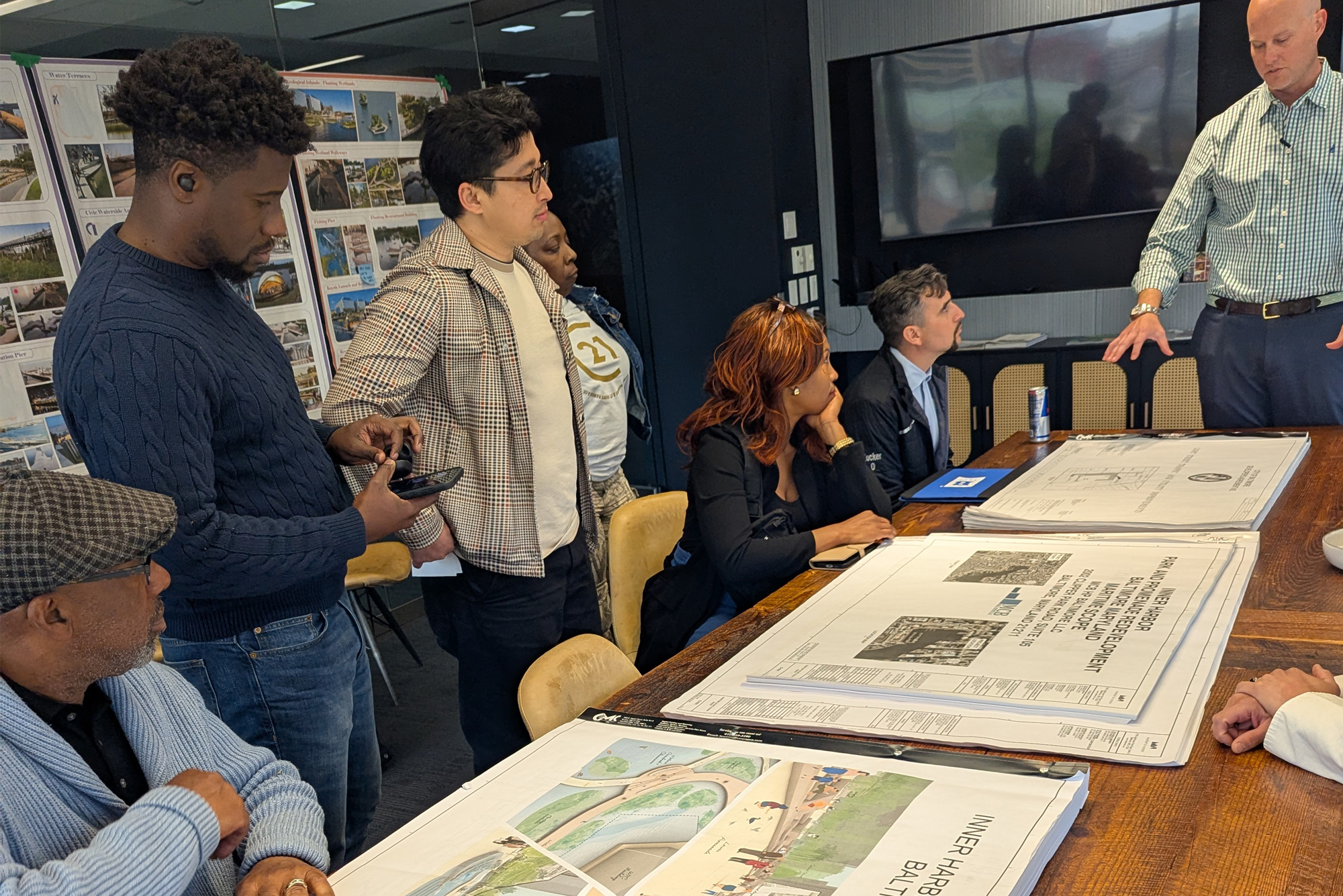 Students listening to the plans of the Middle Branch