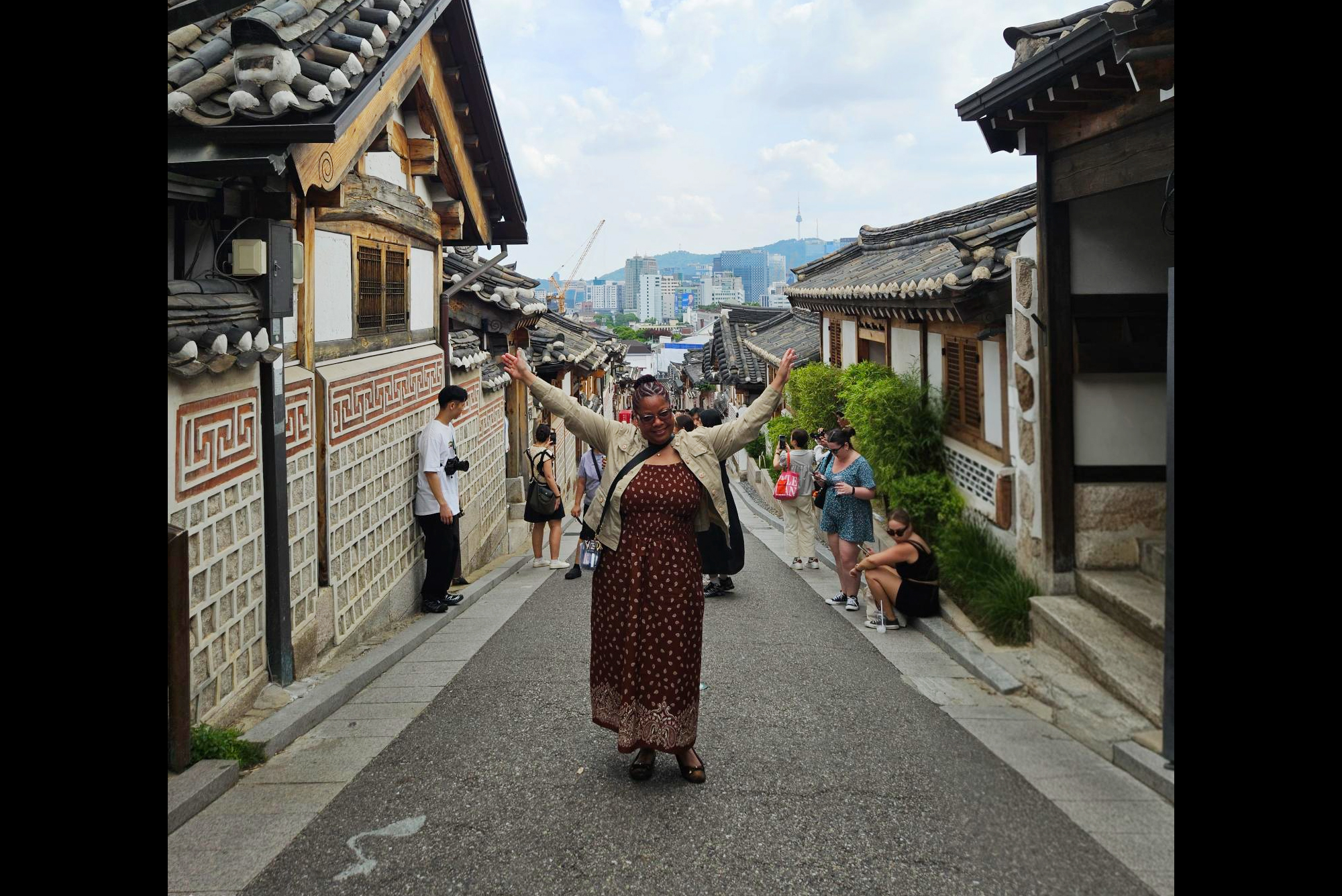 Erica Hill poses in Seoul, Korea