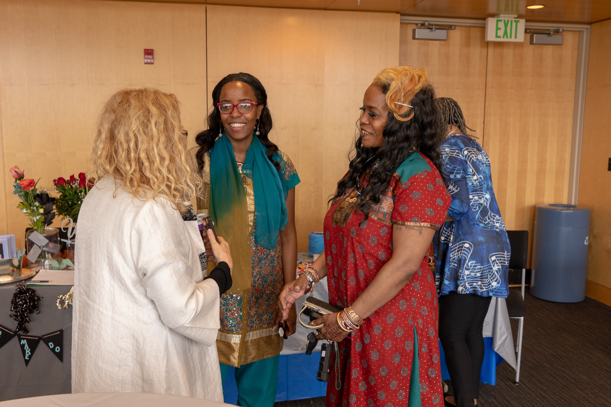 three women talking at the reception