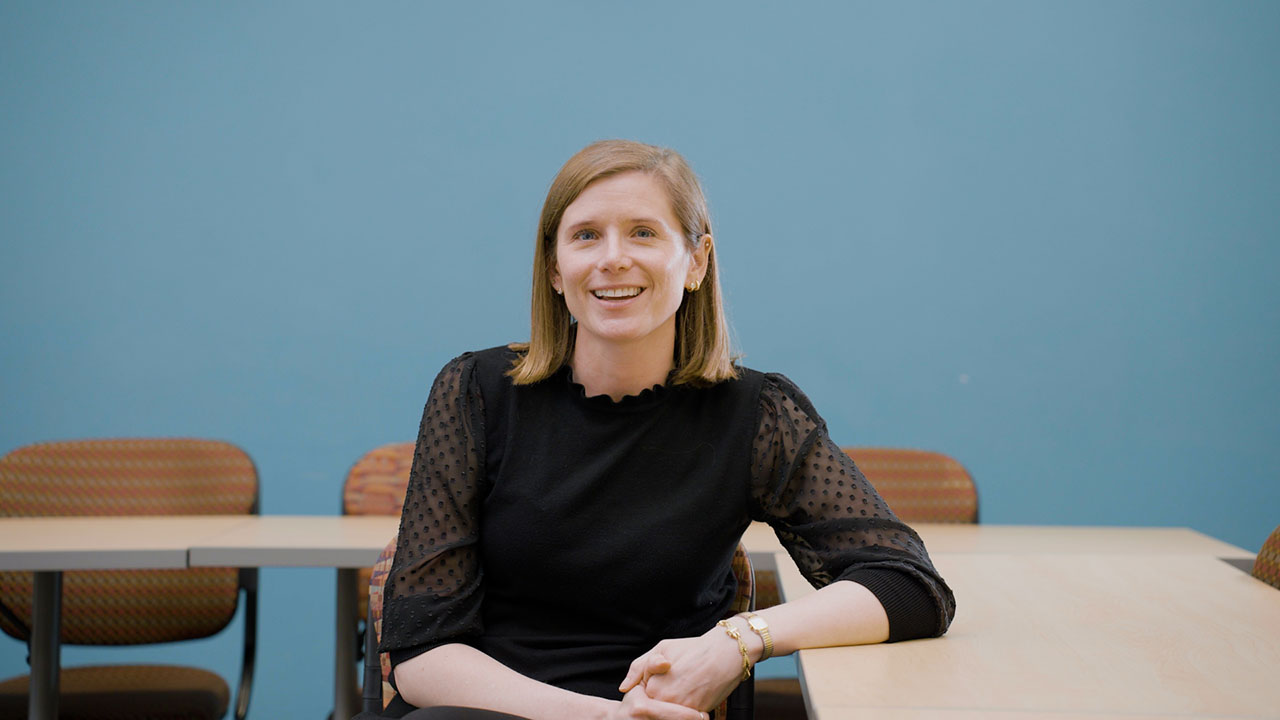 Jennifer Keohane, Ph.D Program Director and Associate Professor at The University of Baltimore, smiles at the camera during a video interview.